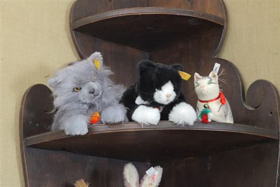 Appraisal: GROUP OF THREE CONTEMPORARY STEIFF CATS Grey ''Radjah'' cat wool