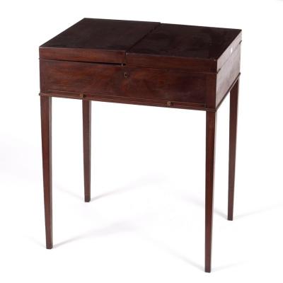 Appraisal: An early th Century mahogany enclosed washstand fitted a false