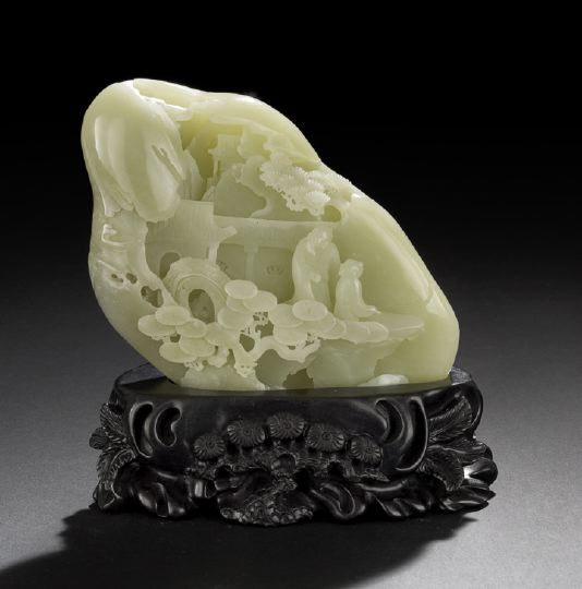 Appraisal: Chinese Well-Carved Celadon Jade Mountain the stone of even celadon