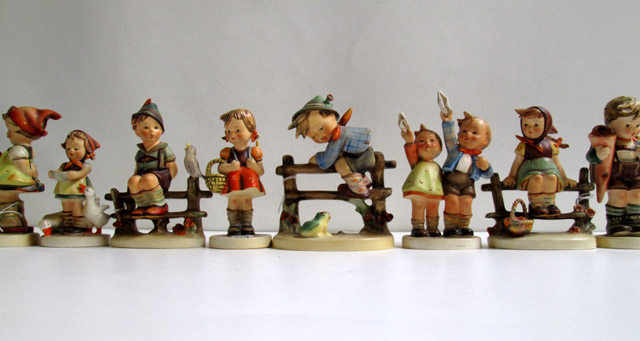 Appraisal: ELEVEN HUMMEL FIGURINES of soft paste porcelain TM- - Retreat