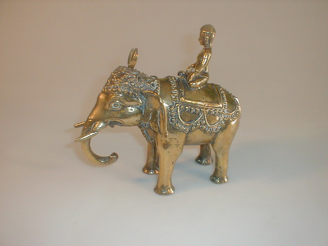 Appraisal: An Indian brass caparisoned elephant and mahout high