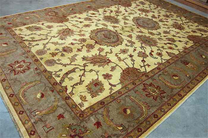 Appraisal: HAND KNOTTED ORIENTAL CARPET Pakistani-Persian leaf and vine motif on