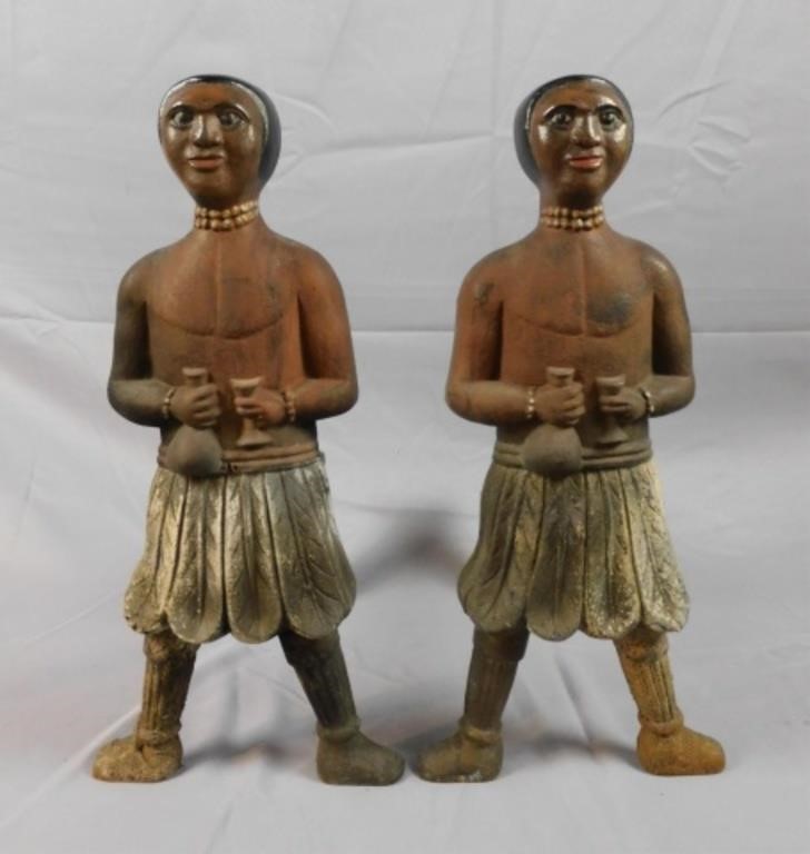 Appraisal: RARE PAIR OF CAST IRON FIGURAL ANDIRONS TH C depicting