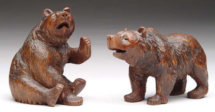 Appraisal: PAIR OF CARVED BLACK FOREST WOOD BEARS One is h