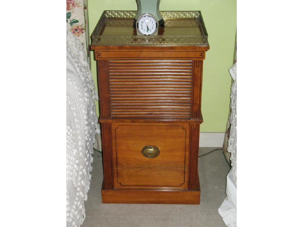 Appraisal: AN EMPIRE STYLE MAHOGANY BEDSIDE CUPBOARD with a pierced brass