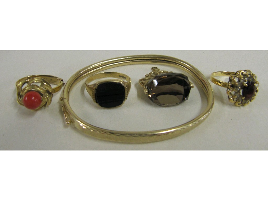 Appraisal: Lot comprising ct gold bangle ct gold mounted revolving fob