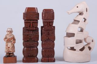 Appraisal: Toriart Mid Includes Two carved wooden Tiki poles each dated