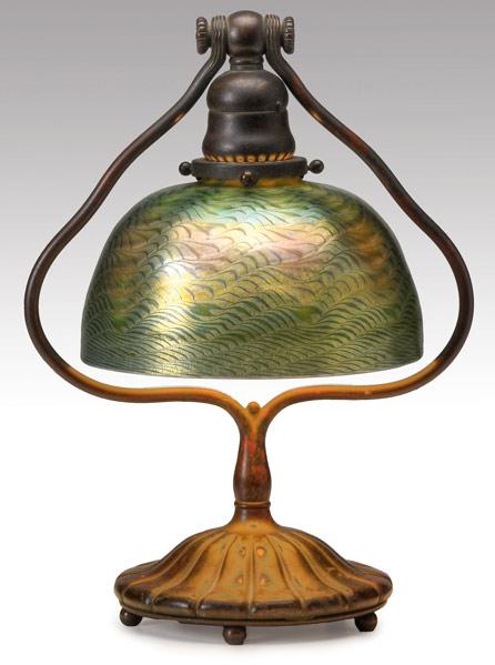 Appraisal: TIFFANY STUDIOS Table lamp with rotating harp and fluted base