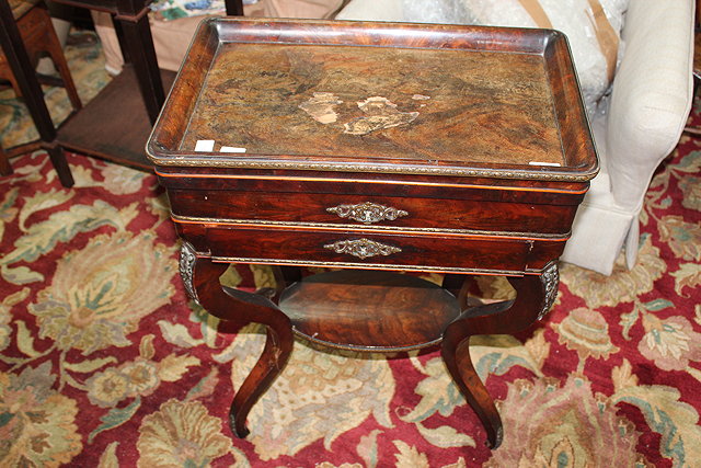 Appraisal: A CONTINENTAL WALNUT TRAY TOP WORK TABLE the lifting lid