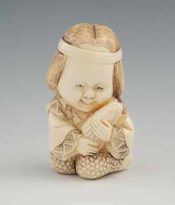 Appraisal: A Carved Ivory Netsuke of a Child Kneeling child with