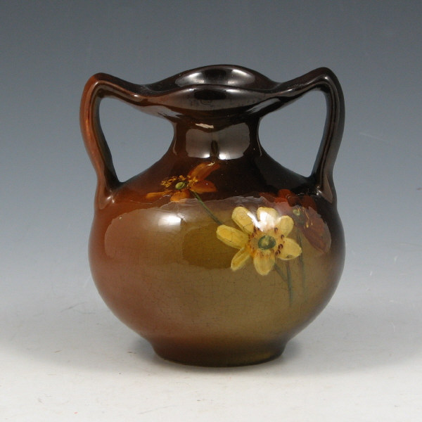 Appraisal: Roseville Rozane handled vase with floral decoration Marked with Rozane