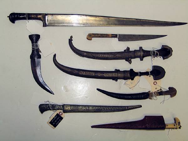 Appraisal: Eight Eastern edged weapons A Khyber knife a bone-handled Indo-Persian