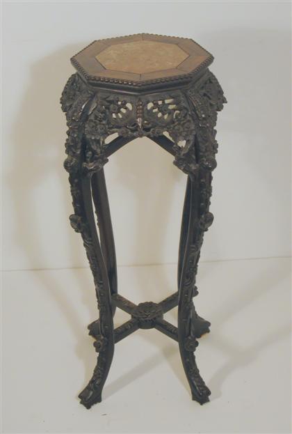 Appraisal: Chinese rosewood stand th th century With decorative openwork carving