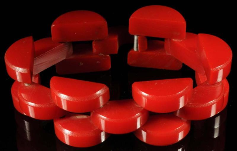 Appraisal: Bakelite Red Link Bracelet Description Depicts three rows of half-circle