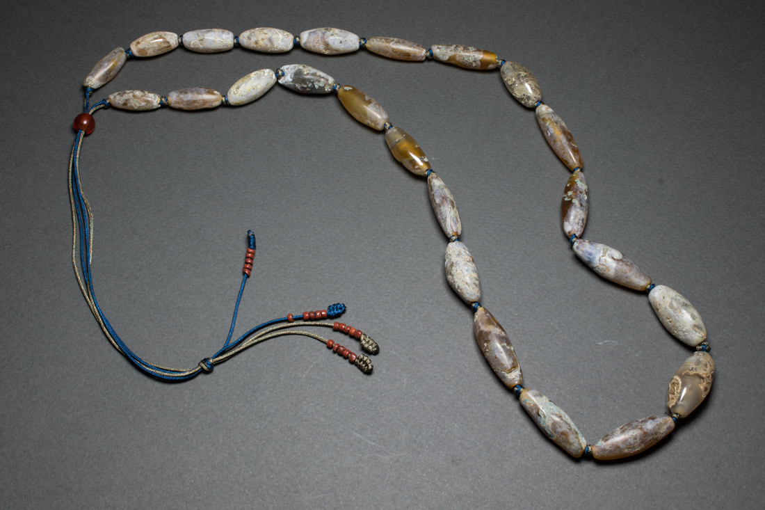 Appraisal: Group of Asian agate beads comprising twenty four cylindrical beads