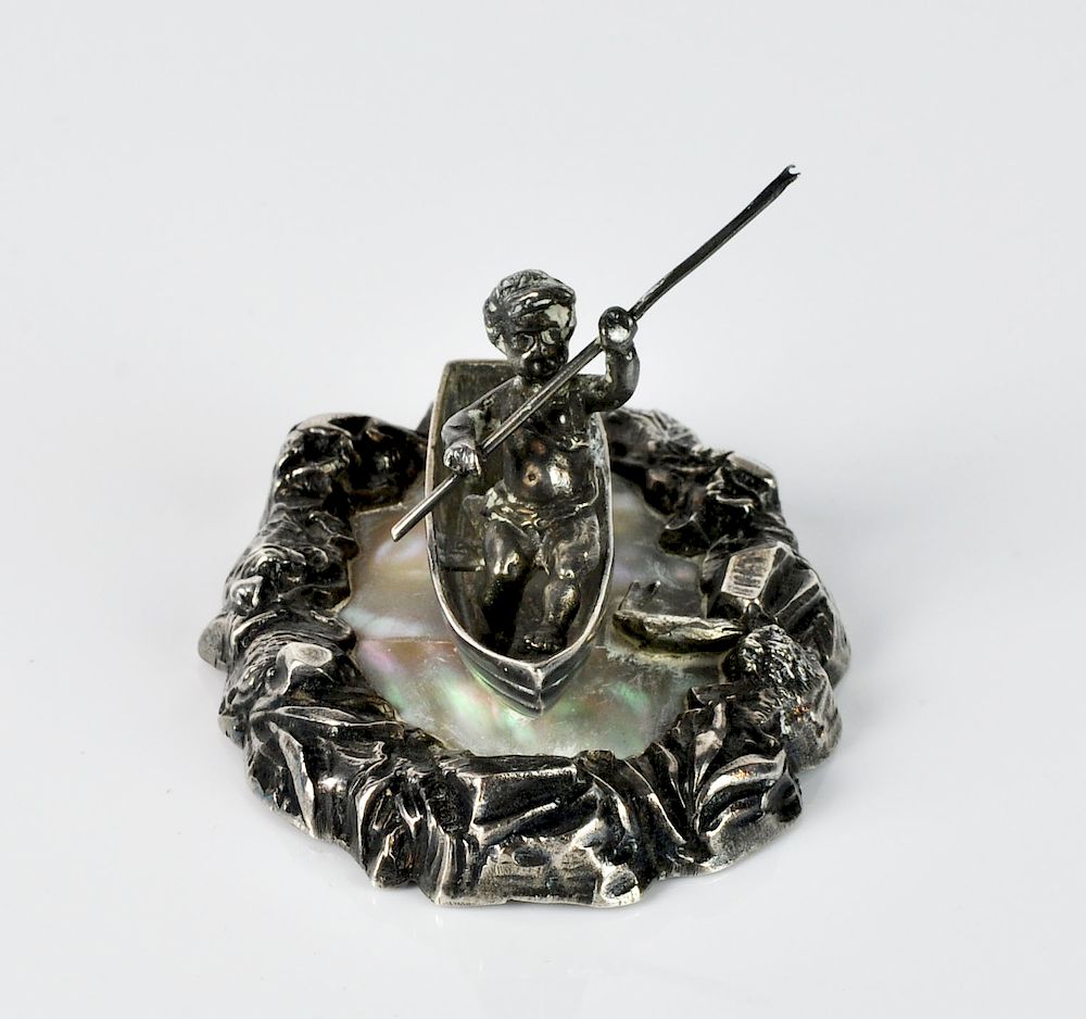 Appraisal: French Sterling Silver Fisherman Cherub on Mother of Pearl French