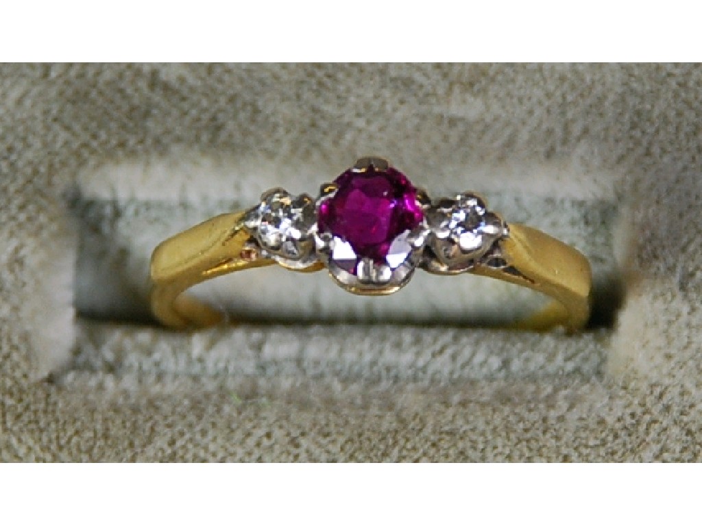 Appraisal: ct GOLD RING set with a centre oval ruby flanked