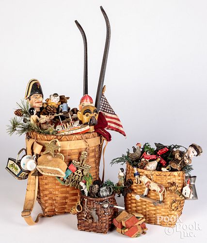 Appraisal: LARGE PEDDLERS BASKETS FILLELD WITH MINIATURESLarge peddlers baskets filled with