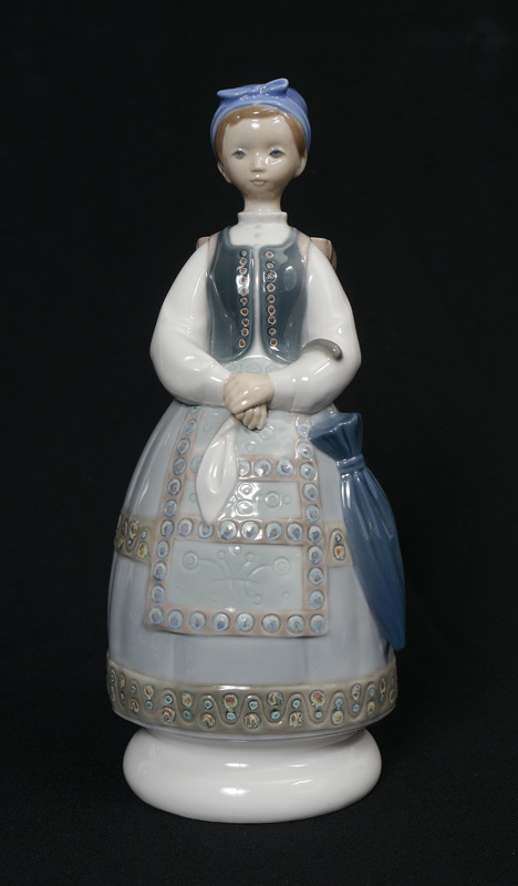 Appraisal: LLADRO PORCELAIN FIGURINE Shepherdess with Traditional Dress Julio Fernandez sculptor