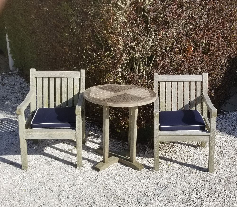 Appraisal: Pair Teak Armchairs and Round Table Pair Teak Armchairs and