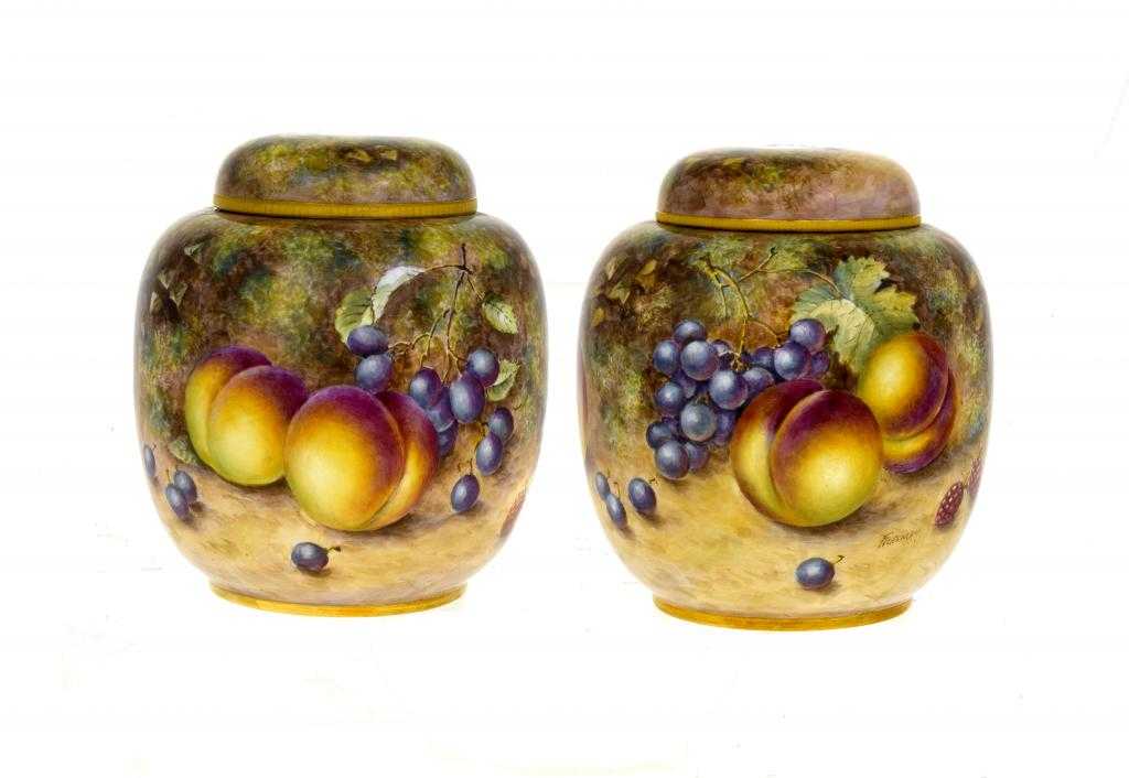 Appraisal: A PAIR OF ROYAL WORCESTER GINGER JARS AND COVERS painted