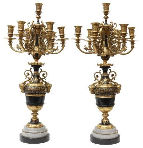 Appraisal: pair French bronze dore et patine candelabra th c seven