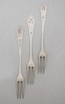 Appraisal: A set of three-prong wavy-end sweet meat forks scratched W