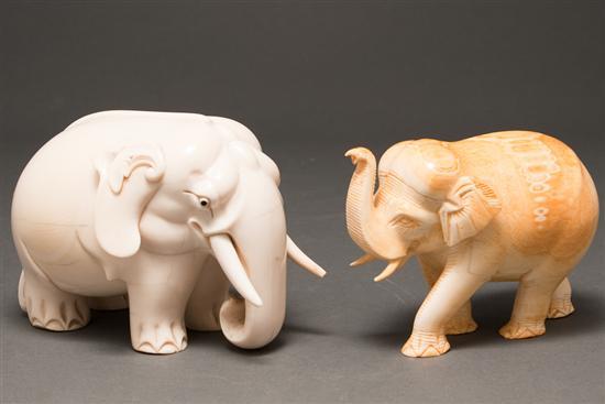 Appraisal: Two Indian carved ivory elephant figures plump elephant - in