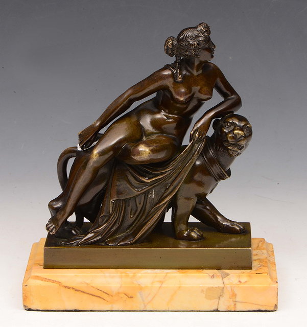 Appraisal: A BRONZE GROUP Ariadne and Panther after Dannecker on a