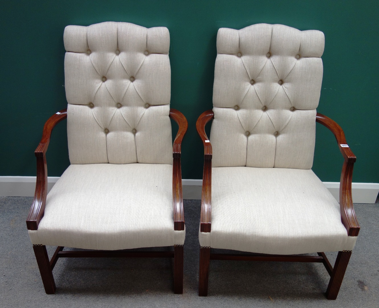 Appraisal: A pair of American th century style Gainsborough open armchairs