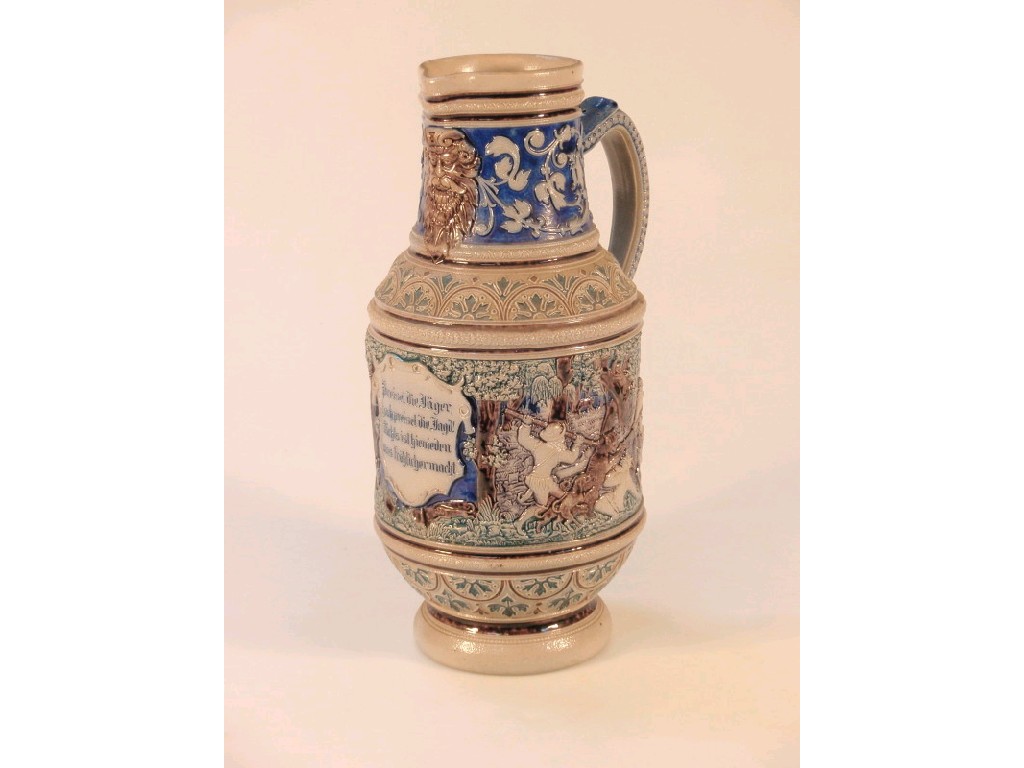 Appraisal: A German grey stoneware jug painted in blue manganese and