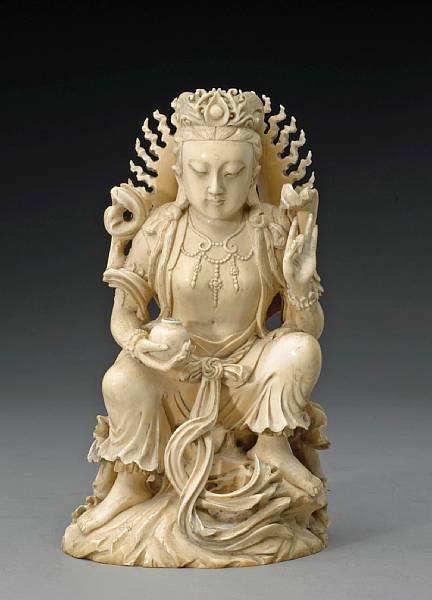 Appraisal: A tinted ivory figure of a kneeling Guanyin th Century