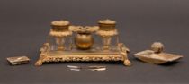 Appraisal: Desk Set and Accessories Pressed metal desk set has a