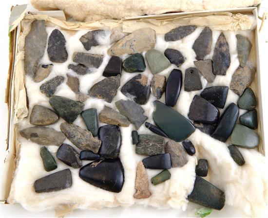 Appraisal: TRIBAL Prehistoric stone weapons and tools including complete arrowheads and