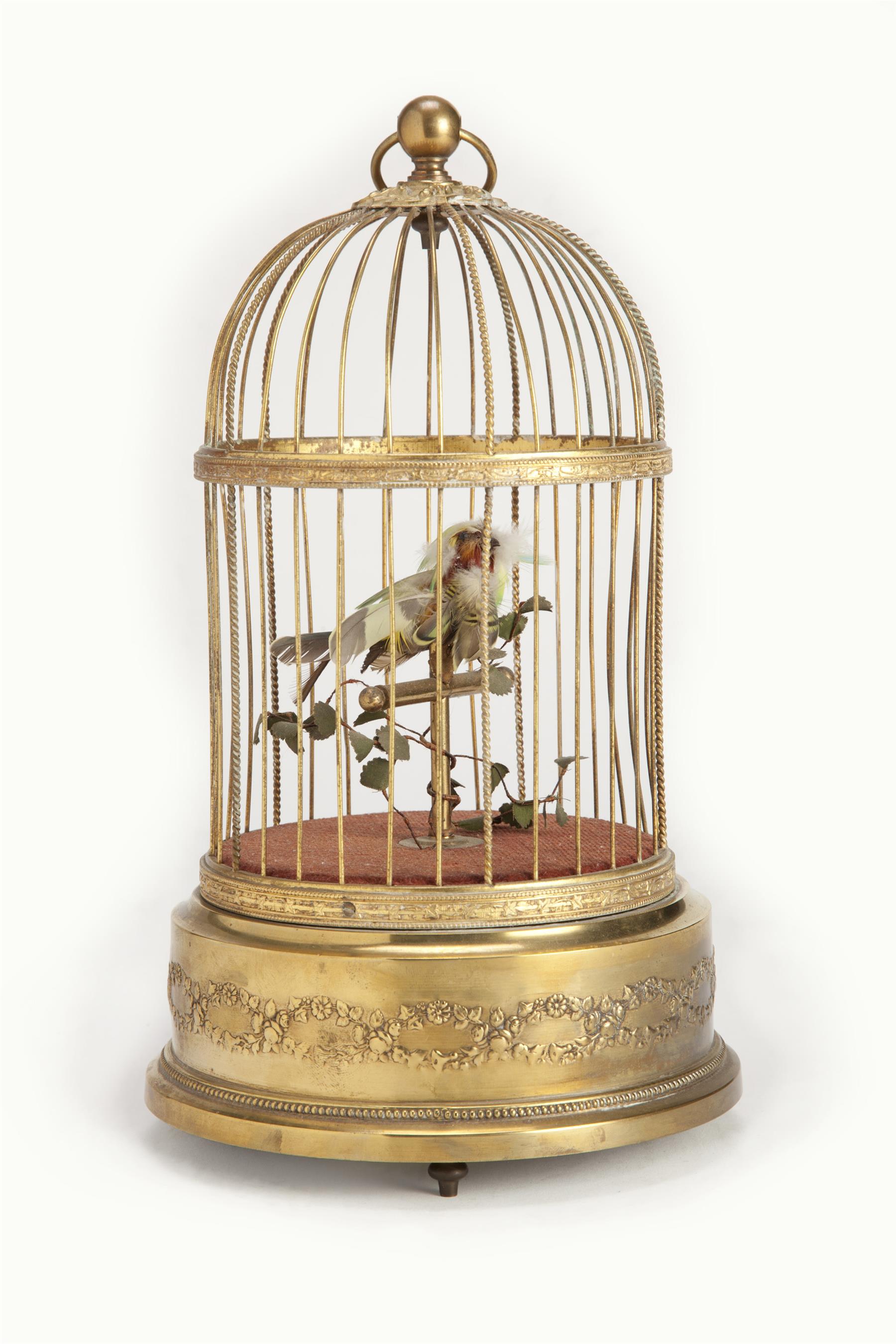 Appraisal: FRENCH BIRD AUTOMATON Early th century Brass cage with feathered