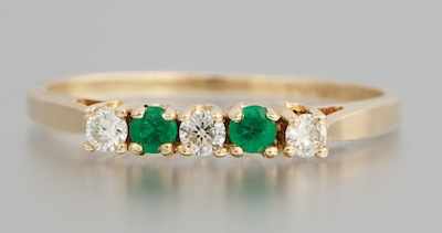 Appraisal: A Ladies' Diamond and Emerald Ring k yellow gold band