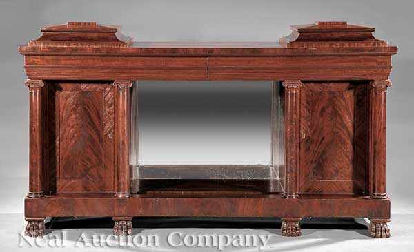 Appraisal: An American Classical Carved Mahogany Sideboard c of architectonic form