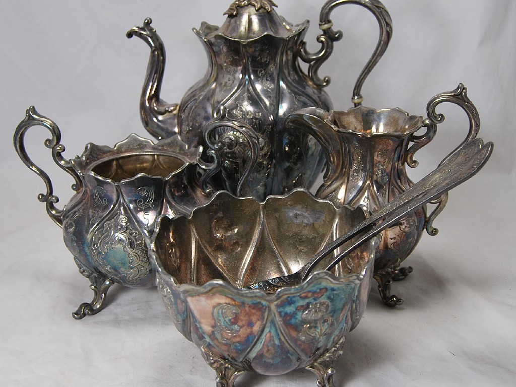 Appraisal: Large Victorian style melon shaped ornate four piece tea service