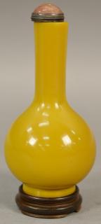 Appraisal: Chinese yellow glass bottle vase with elongated slender neck and