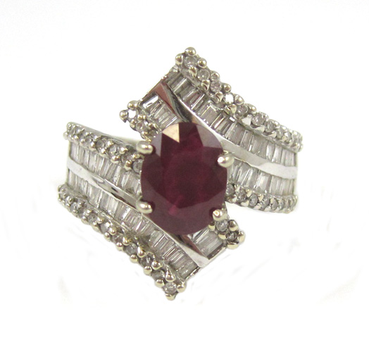 Appraisal: RUBY DIAMOND AND FOURTEEN KARAT WHITE GOLD RING with round-cut