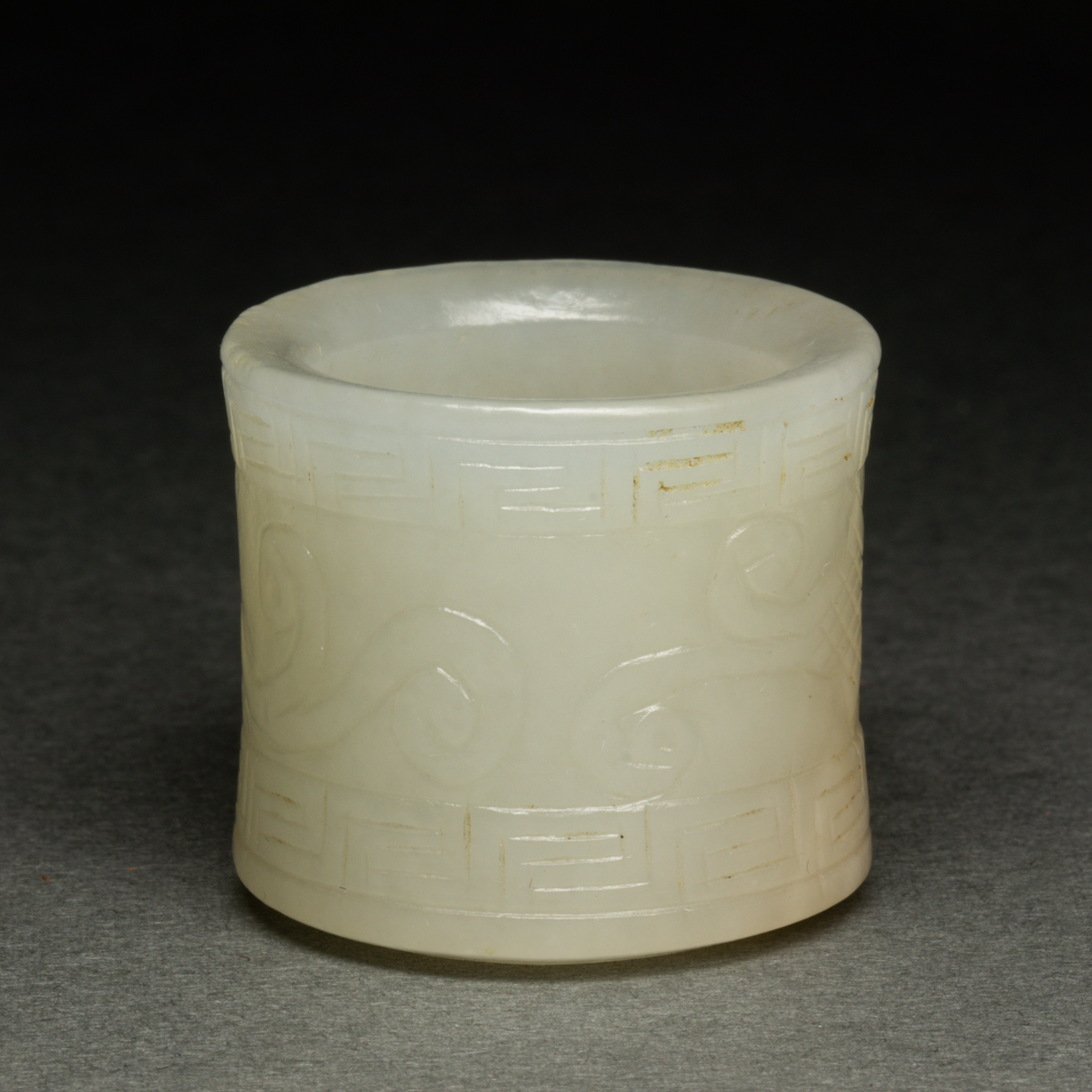 Appraisal: CHINESE WHITE JADE ARCHER'S RING Chinese white jade archer's ring