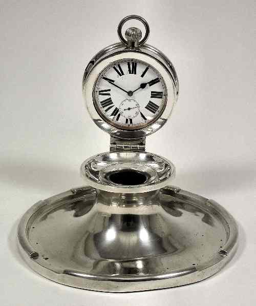 Appraisal: A George V silver capstan pattern combined inkwell and watch