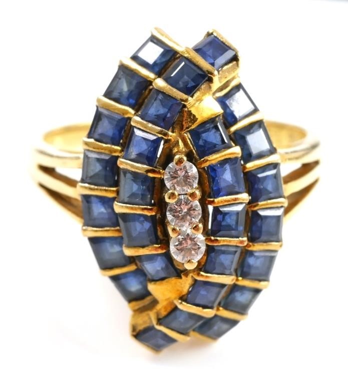 Appraisal: K yellow gold fashion ring contains square faceted sapphires Sapphire