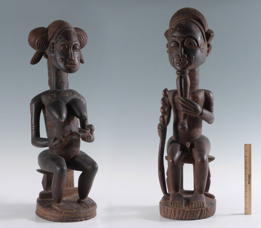 Appraisal: PAIR CARVED AFRICAN BAULE MATERNITY FEMALE MALE FIGURES piece depicting