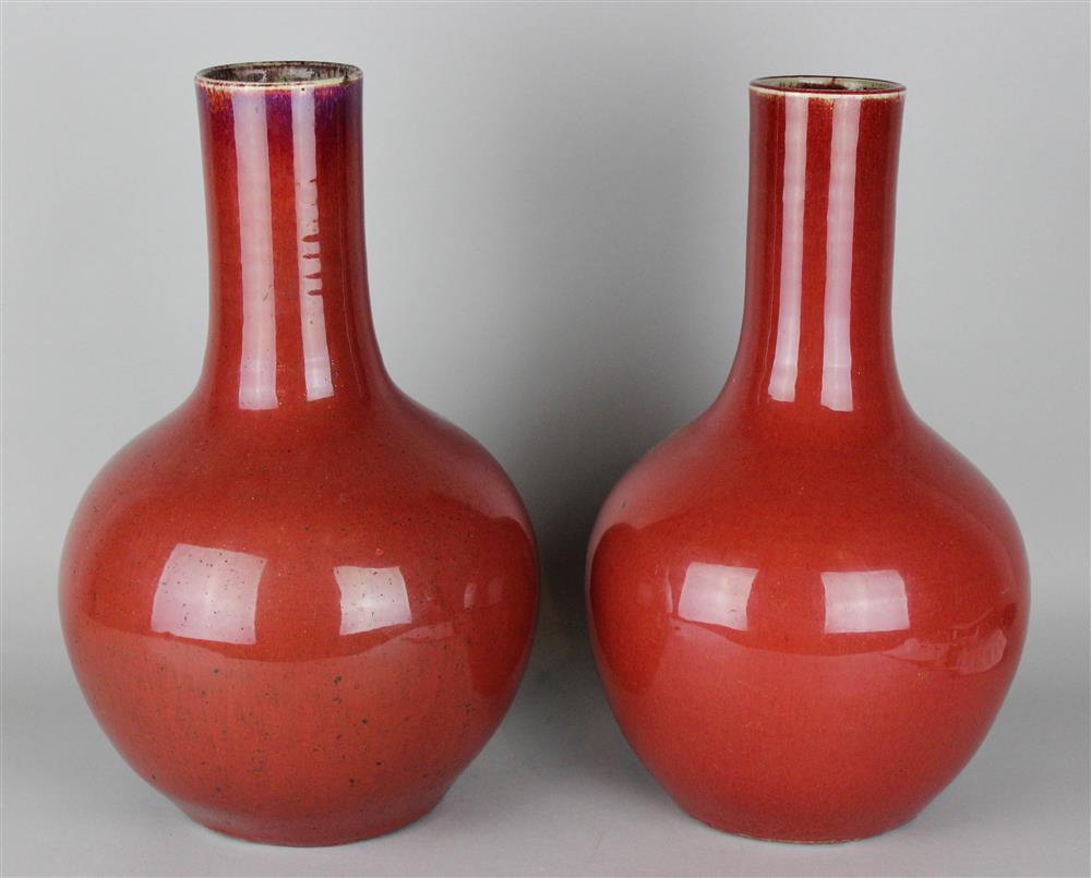 Appraisal: PAIR OF SIMILAR CHINESE SANG- DE- BOEUF-GLAZED VASES QING DYNASTY