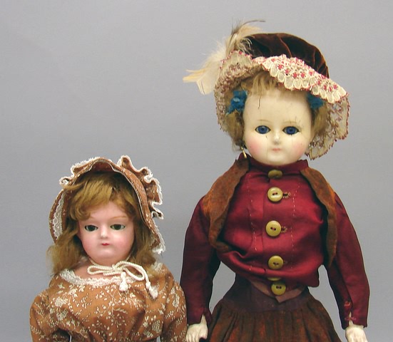 Appraisal: Pair of wax over papier mache dolls with sleep eyes