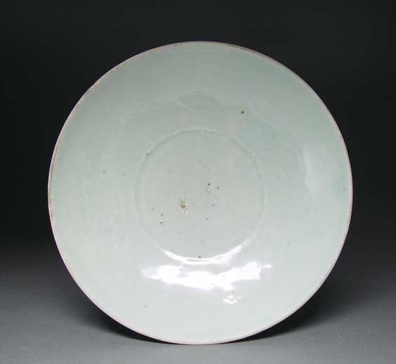 Appraisal: YUAN WHITEWARE DISH Chinese Yuan Dynasty whiteware dish of wide