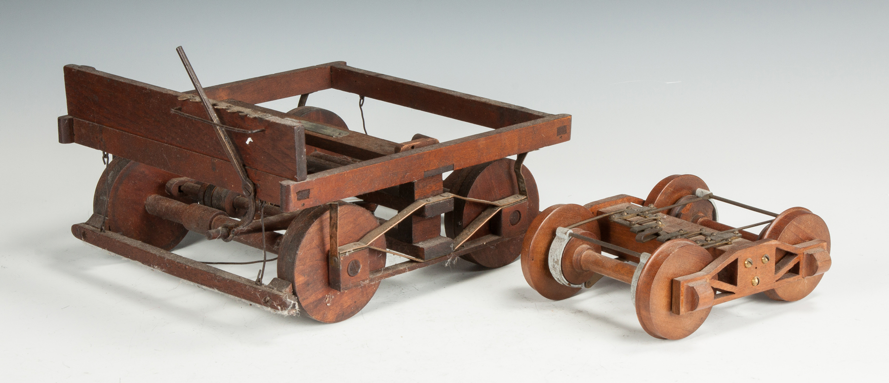 Appraisal: Two Walnut Brass Patent Model Train Brakes Both late th