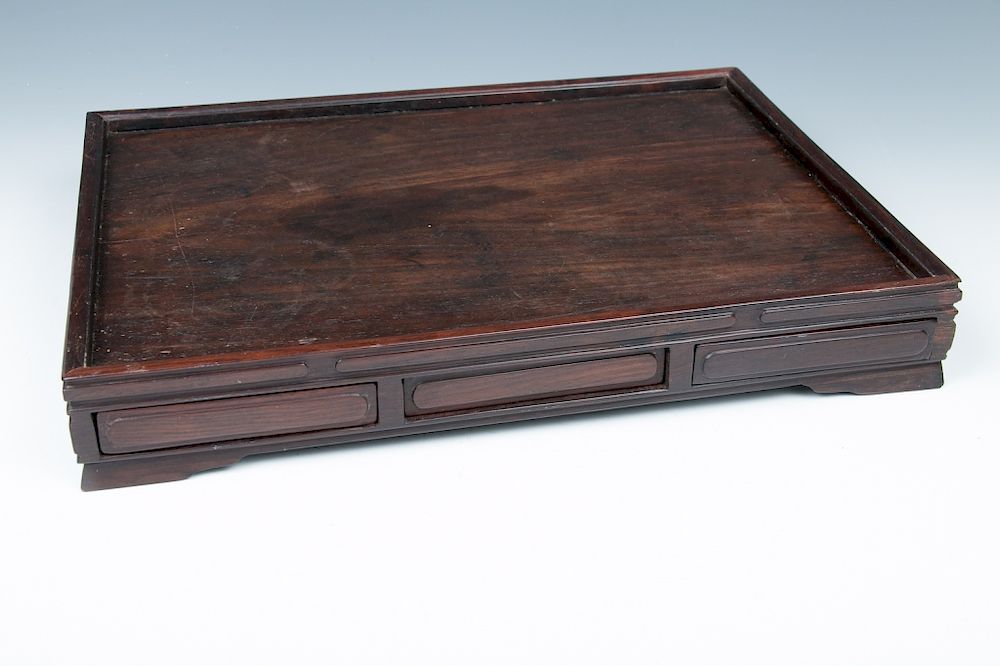 Appraisal: HARDWOOD STAND WITH THREE DRAWERS Of a rectangular section the