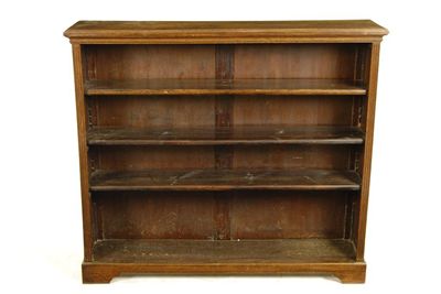 Appraisal: An oak open bookcase with three adjustable shelves on bracket